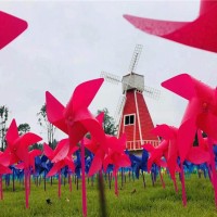 七彩风车节厂家大型七彩风车长廊制作荷兰风车展公司面向全国